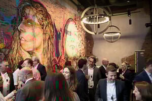 A group of people gathering at an event