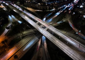An intersecting highway at night