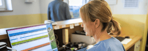 Healthcare worker on a desktop computer